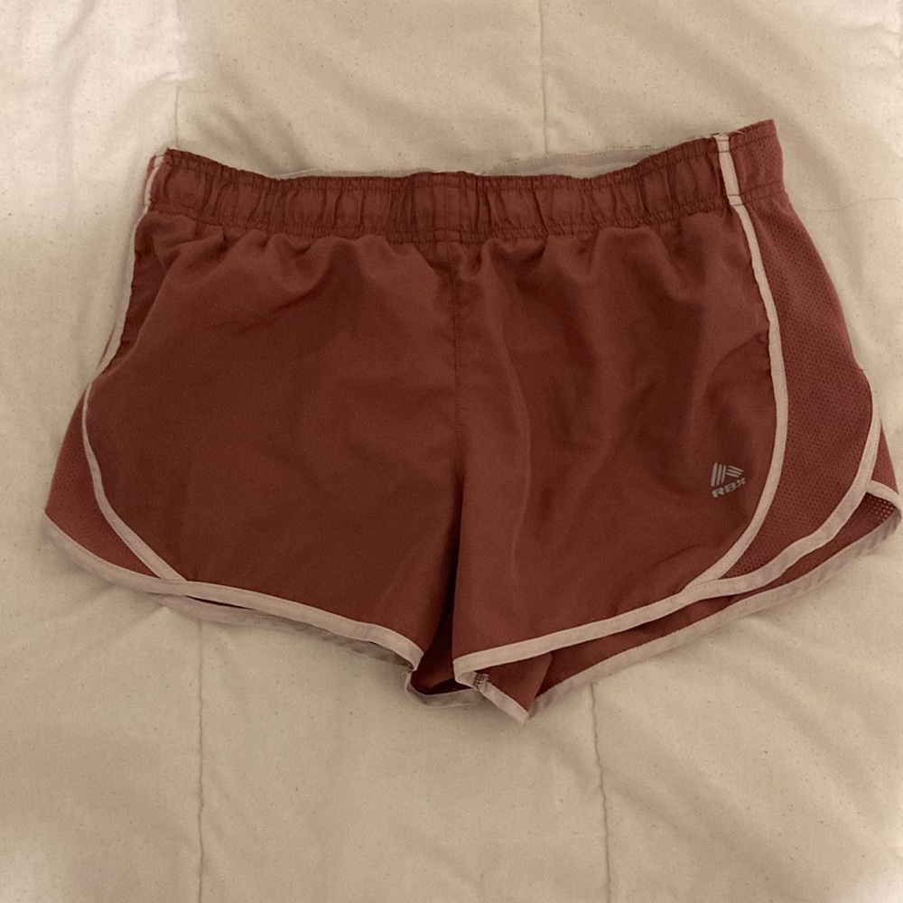 small RBX pink athletic shorts with inside liner and pocket